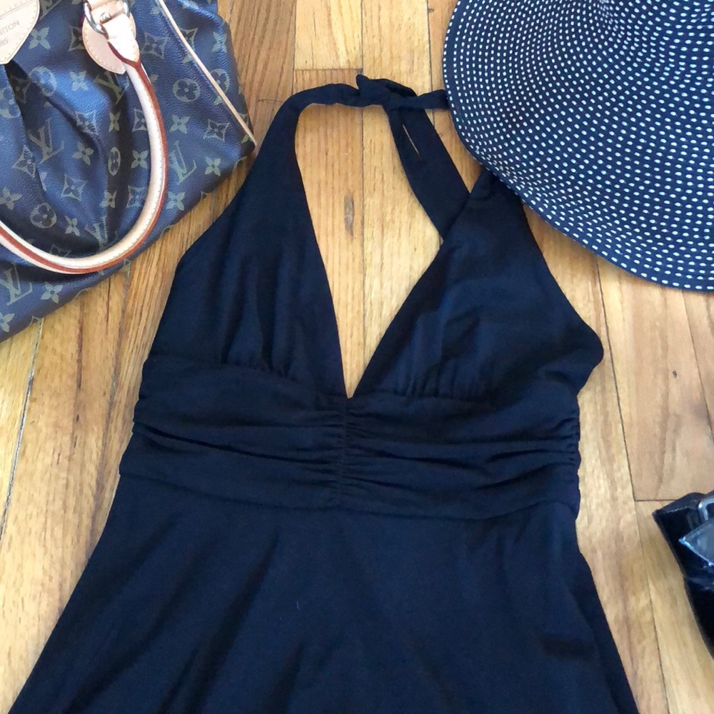 Beautiful and elegant black dress by BCBG